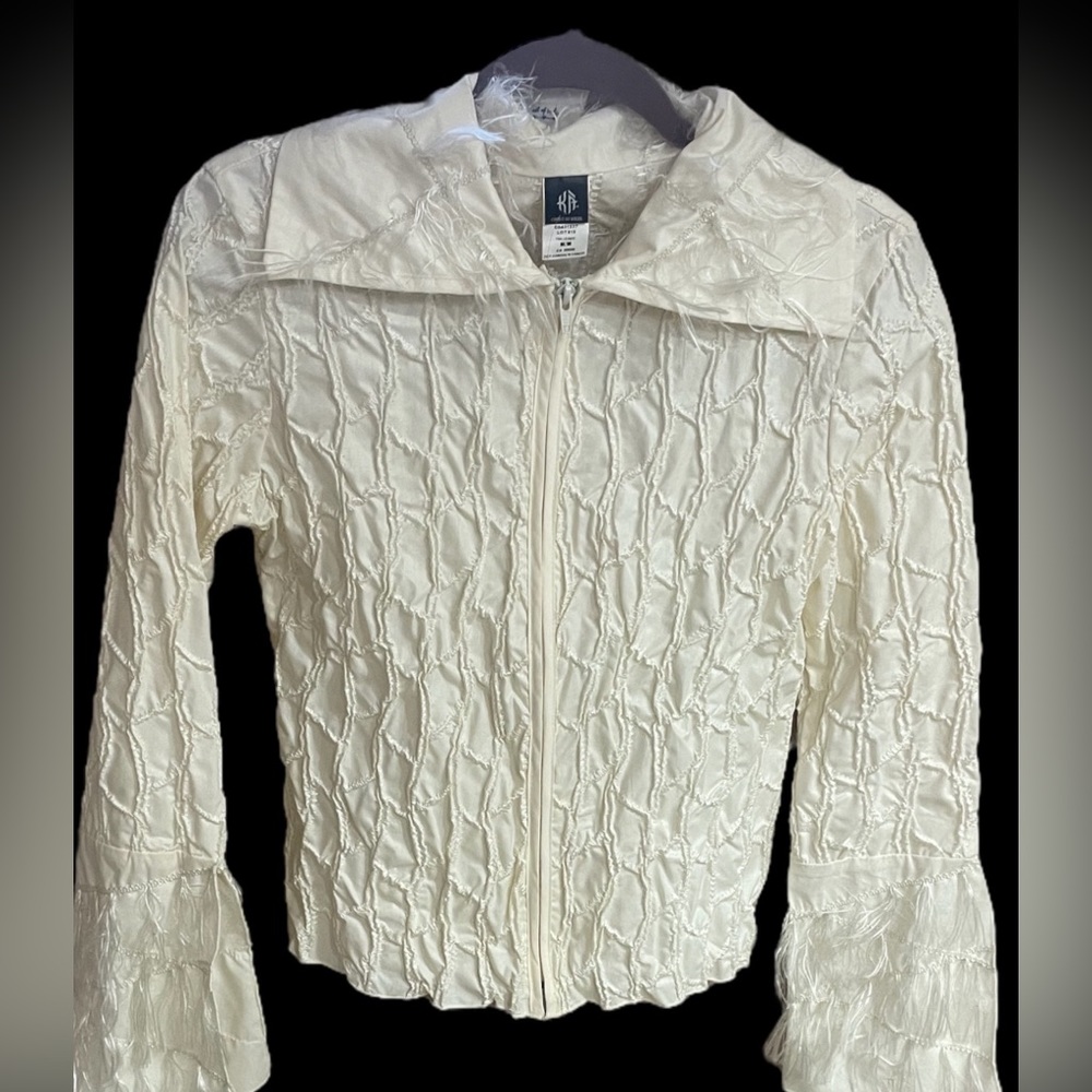 Vintage Cirque du Soleil cream jacket